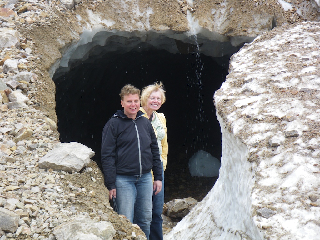 Karin and Emma in the mouth of the Glaciar tunnel at Mount Edith Cavell